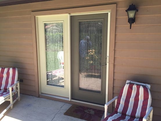 A patio door with two sets of glass.