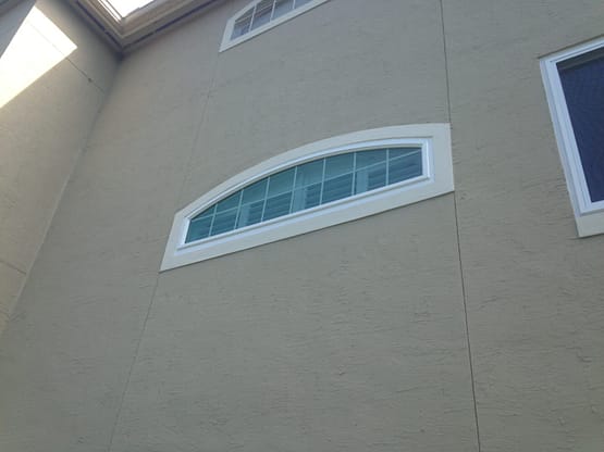 A window on the side of a building.