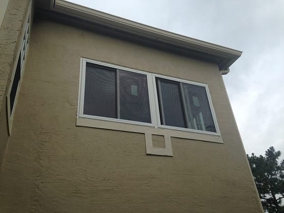 A window that is on the side of a building.