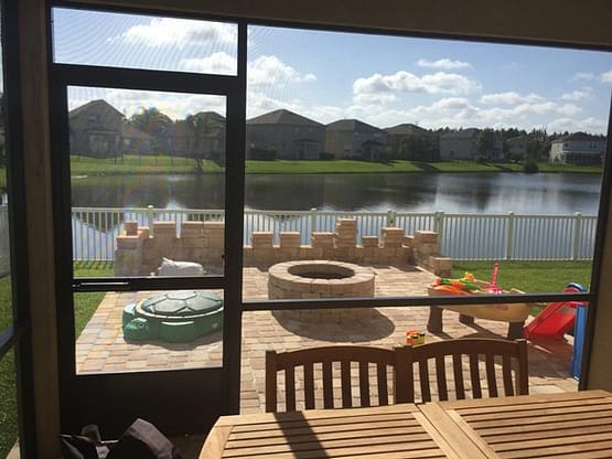 A view of a lake from outside the house.