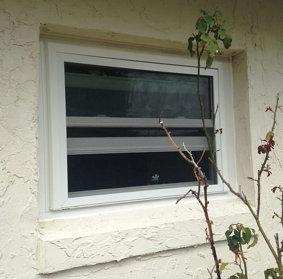 A window with a black and white stripe on it.