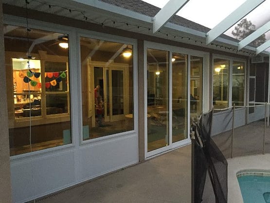 A building with many windows and doors on the outside.